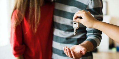 handing over keys to tenants